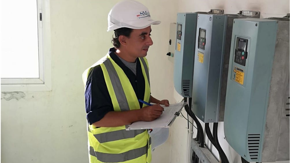 photo of an operator checking the Variable speed drive