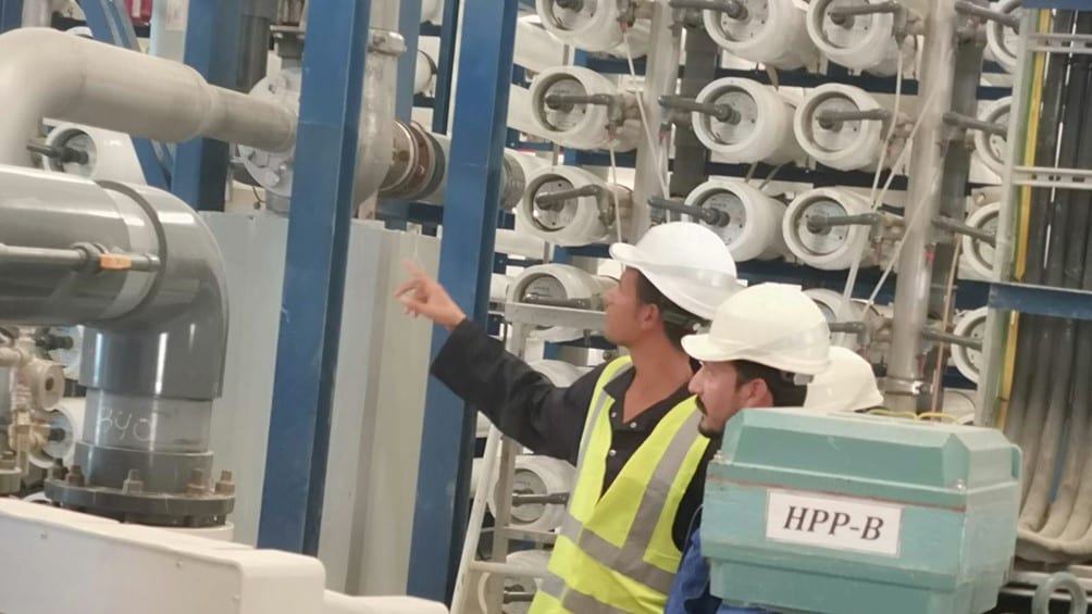 photo of an operator monitor a reverse osmosis plant