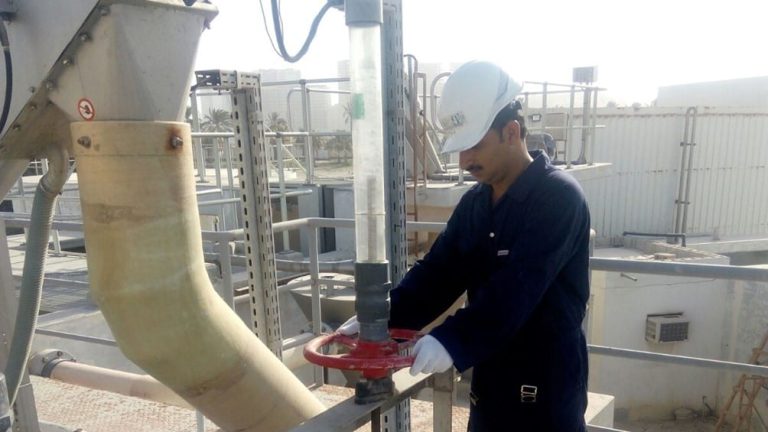 photo of smart water operator open a valve