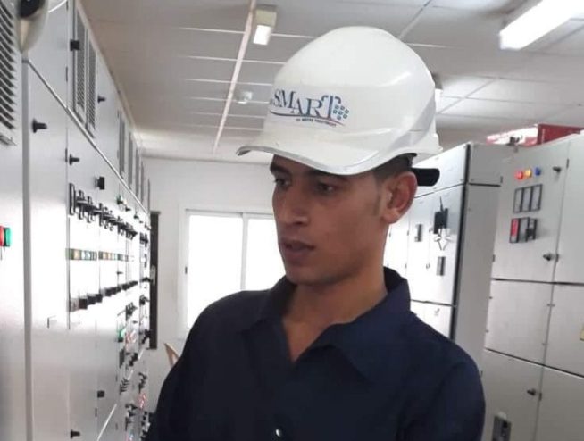 Photo of smart water treatment technology operator checking the operation parameters of the sewage treatment plant